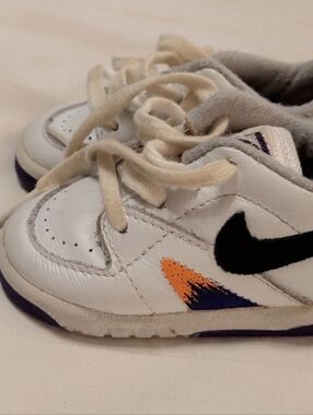 Nike White Sneakers with Black Swoosh and Purple & Orange Accents, Baby Size